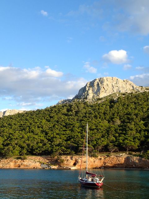 Anchored off the island of Moni, with a long line ashore.