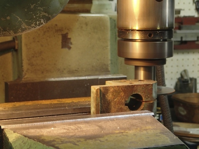 A heavy duty machinist's drill with a disc attached makes the cut.