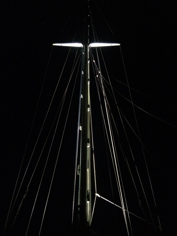 ...but really shines (no pun intended) as darkness falls. This is the back side of the mast.